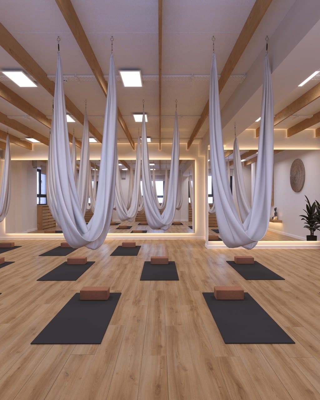 Занятие по йоге в гамаках